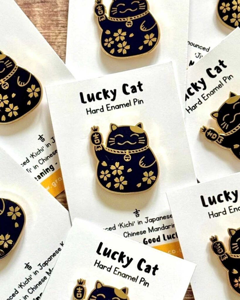 enamel pins inspired by Grace Wong linocut prints